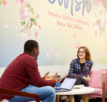 Students sitting together talking 